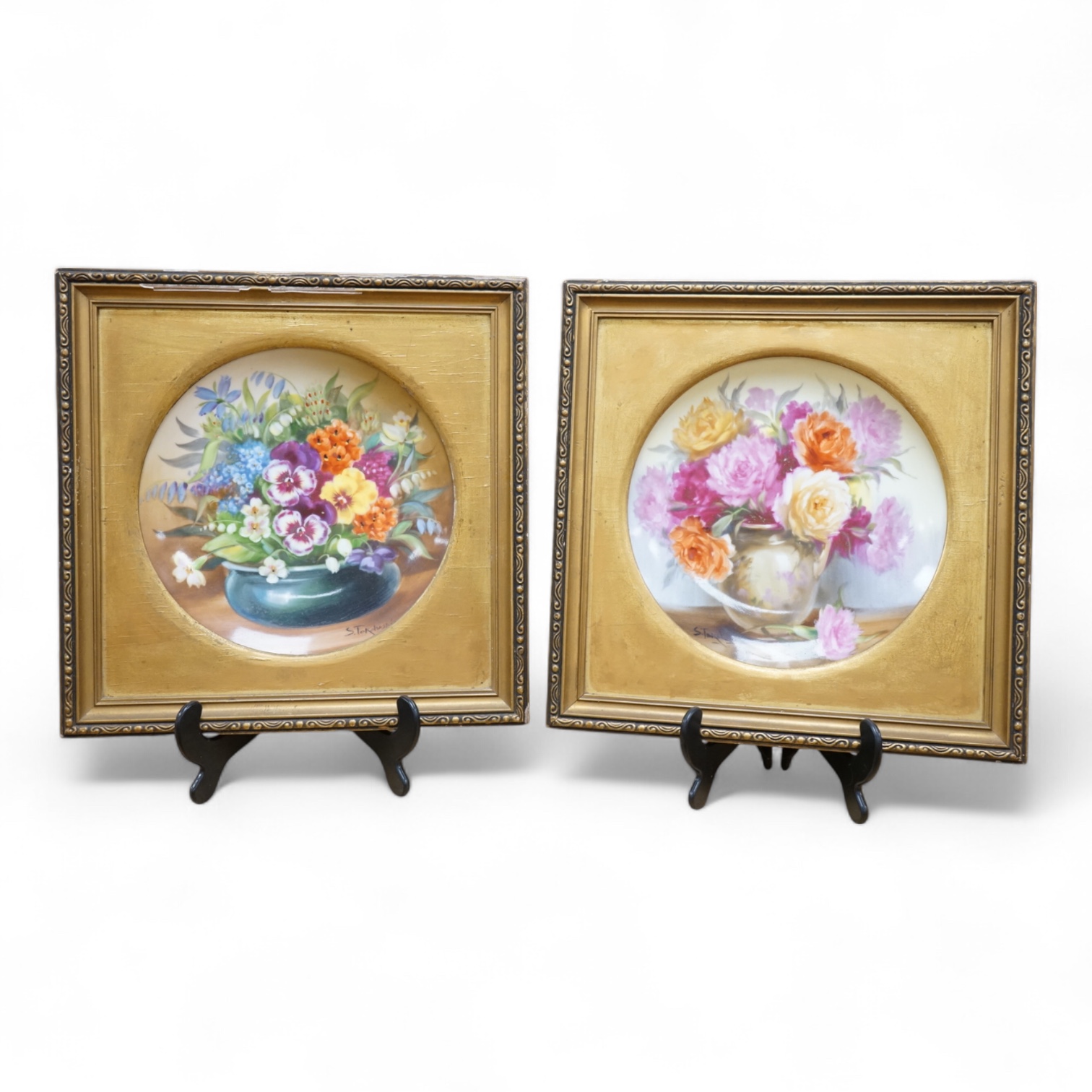 A pair of Noritake floral plates, signed S. Tokohashi, frames in gilt mounts and frames, plates 18.5cm diameter.